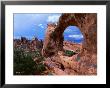 Looking Through An Arch In Arches National Monument, Utah, Arches National Park, Usa by Mark Newman Limited Edition Print