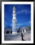 Woman Walking Past Minaret Eydhafushi, South Maalhosmadulu Atoll, Baa, Maldives by John Borthwick Limited Edition Print