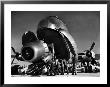 Crewmen Unloading Huge B50 Bomber Plane Engine Used As A Spare From The Belly Of A C124 Cargo Plane by Margaret Bourke-White Limited Edition Print