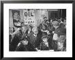 Town Residents Standing In Gas Station, Discussing Problems Caused By Oil Boom by Bernard Hoffman Limited Edition Print