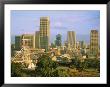 An Abandoned Mining Headframe Sits In Front Of Skyscrapers Downtown by Michael S. Lewis Limited Edition Print