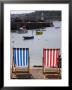 Deck Chairs Facing The Harbour, St. Ives, Cornwall, England by Glenn Beanland Limited Edition Print