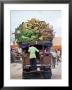 Van Loaded With Bananas On Its Roof Leaving The Market, Stone Town, Zanzibar, Tanzania by Yadid Levy Limited Edition Pricing Art Print