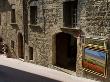 Walking Down Streets In San Gimignano, Italy by Robert Eighmie Limited Edition Print