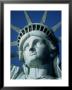 The Statue Of Liberty Against A Cityscape In Smog by Michael Howell Limited Edition Print