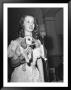 Actress Bette Davis Holding Puppy Raffled Off During Her Tailwaggers Party To Benefit Stray Dogs by Rex Hardy Jr. Limited Edition Print