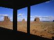 Visitor Center's Windows Frame The Two Mittens And Merrick Buttes by Stephen St. John Limited Edition Print