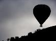 Hot Air Ballon Flys Over Ridge Of Mountain by Scott Stulberg Limited Edition Print