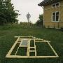 Mould Of A House And A Man Standing In Stepladder by Mikael Andersson Limited Edition Print