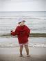 Rear View Of A Girl Standing On The Beach by Gunilla Lundstrom Limited Edition Print