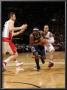 Denver Nuggets V Toronto Raptors: Ty Lawson And Jerryd Bayless by Ron Turenne Limited Edition Print