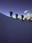 Climbers Silhouetted In Morning Sun, New Zealand by Michael Brown Limited Edition Pricing Art Print