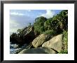 Granite Rocks At The Beach, La Digue, Seychelles by Berndt Fischer Limited Edition Print