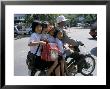 Children Riding On A Motor Scooter, Phnom Penh, Cambodia, Indochina, Southeast Asia by Bruno Morandi Limited Edition Print