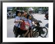 Children Riding On A Motor Scooter, Phnom Penh, Cambodia, Indochina, Southeast Asia by Bruno Morandi Limited Edition Pricing Art Print