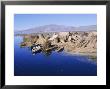 Uros Indian Dwellings, Beside Lake, Peru, South America by Richard Ashworth Limited Edition Print