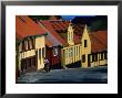 Postman Delivering Mail In Allinge, Allinge,Bornholm, Denmark by Anders Blomqvist Limited Edition Print