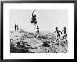 Bushman Children Playing Games On Sand Dunes by Nat Farbman Limited Edition Pricing Art Print