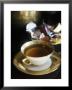 A Cup Of Tea With Chocolate Truffles In Background by Bernhard Winkelmann Limited Edition Print