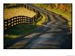 Twilight View Of A Wooden Fence And Its Shadow Along A Country Road by Kenneth Garrett Limited Edition Pricing Art Print