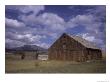 The Ruins Of A Farm Sit In A Plains With Mountains Visible, Central Colorado by Taylor S. Kennedy Limited Edition Print