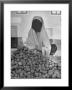 Moslem Woman Shopping For Potatoes by John Phillips Limited Edition Print