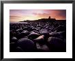 Dunstanburgh Castle At Sunrise From Boulderfield At Embleton Bay, Northumberland (Northumbria) by Lee Frost Limited Edition Print