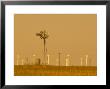 Usa, Texas, Near Amarillo, Route 66, Old Windpump And Modern Wind Turbines by Alan Copson Limited Edition Print