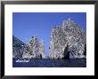 Faraglioni Rocks With A Boat In The Bay Of Naples At Capri Island In Italy by Richard Nowitz Limited Edition Print