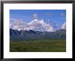Mt. Mckinley And Cumulus Clouds In Late Morning Light by John Eastcott & Yva Momatiuk Limited Edition Print
