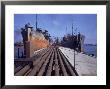 Pipeline Running To Loading Pier At Oil Refinery by Dmitri Kessel Limited Edition Pricing Art Print