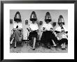 Women Sitting And Reading Under Hairdryers At Rockefeller Center Pamper Club by Nina Leen Limited Edition Print