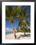 Woman Leaning Against Palm Tree, Princess Cays, Eleuthera Island, West Indies, Caribbean by Richard Cummins Limited Edition Print