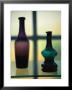 Colored Glass Bottles Are Displayed In The Sandwich Glass Museum by Michael Melford Limited Edition Print