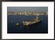 Aircraft Carrier With Skyline Of San Diego, California by Phil Schermeister Limited Edition Print