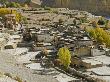 Village With Buddhist Chortens In Mustang, Nepal by Stephen Sharnoff Limited Edition Print