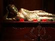 Golden Statue Of A Reclining Woman by Andrew Brownbill Limited Edition Print