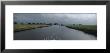 Motorboat In A Canal, Friesland, Netherlands by Panoramic Images Limited Edition Pricing Art Print