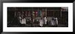 Three Men Getting A Hair Cut In Front Of A Building, Beijing, China by Panoramic Images Limited Edition Print