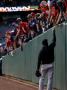 Texas Rangers V. San Francisco Giants, Game 5:  A Player From The San Francisco Giants Hands A Ball by Doug Pensinger Limited Edition Print