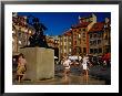 Children Playing Around Mermaid Statue In Rynek Starego Miasta, Warsaw, Poland by Witold Skrypczak Limited Edition Print