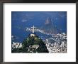 City With The Cristo Redentor Statue In Foreground And Pao De Acucar In The Background, Brazil by Marco Simoni Limited Edition Print