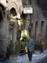 Elderly Gentleman Walking Down Streets Of San Gimignano, Italy by Robert Eighmie Limited Edition Print