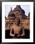 Statue In Buddhist Complex, Borobudur, Indonesia by Juliet Coombe Limited Edition Print
