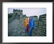 Colorful Chinese Robes Are Displayed Along The Great Wall by Jodi Cobb Limited Edition Print