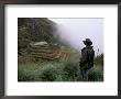 Tourist Watches Clouds Swirl Around Mountains, Inca Trail, Peru, South America by Jane Sweeney Limited Edition Print
