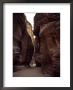 Hikers In The Siq Canyon Leading To Petra by Gordon Wiltsie Limited Edition Print