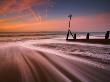 Surging Tide At Dawn On A Hayling Island Beach, Hampshire, England by Adam Burton Limited Edition Print