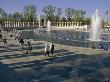 Visitors Enjoy The Fountains And Columns Of The World War Ii Memorial by Stephen St. John Limited Edition Print