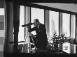 Secretary Of State Designate William Rogers Peering Through Telescope, Out Of His Office Window by Alfred Eisenstaedt Limited Edition Pricing Art Print